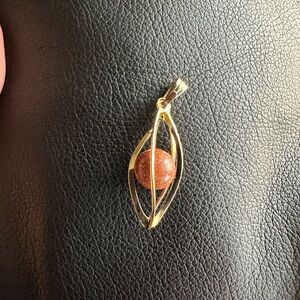 Gold-Tone Women's Pendant with Goldstone stone